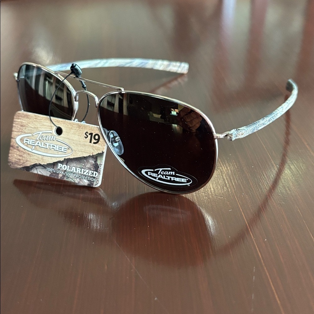 Realtree Polarized 100% UVA/UVB protection, mirror, camo print arm,gold frame